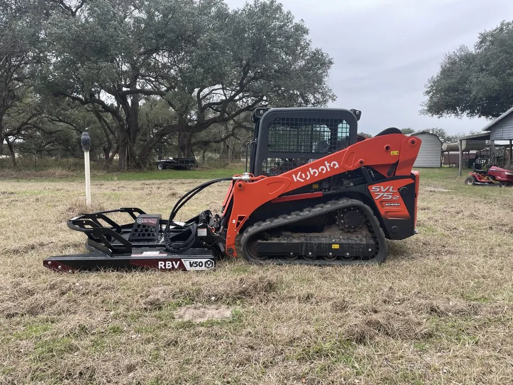 Custom landscape design in Yoakum, TX by Copperhead Land Solutions