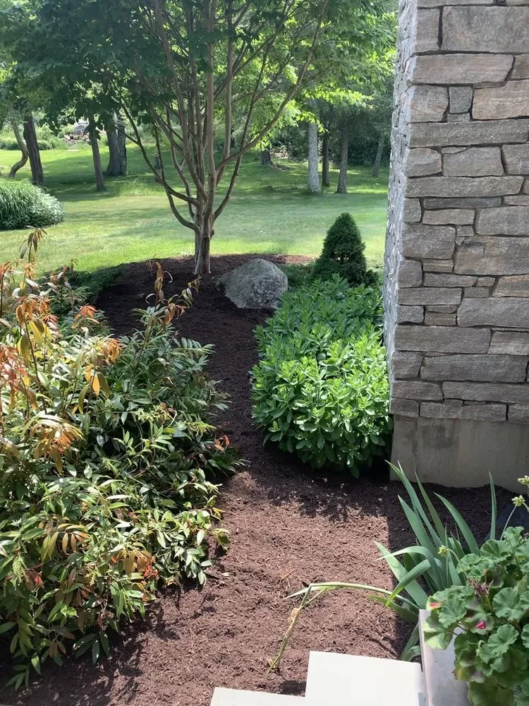 Professional landscaping services for homes in Charlestown, RI by Coppermyne Farm