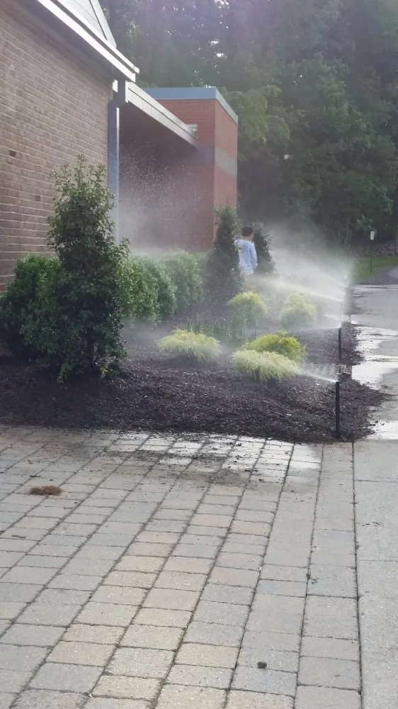 Professional landscape installation with custom design in Fair Lawn, NJ by Corner To Corner Irrigation and Landscaping