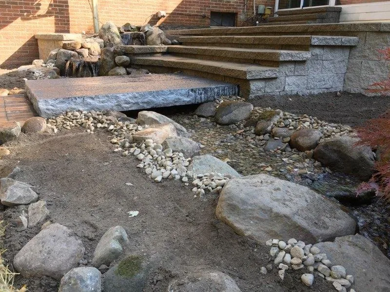 Custom lawn mowing service for residential properties in Rochester, MI by Cornerstone Brick Paving & Landscape