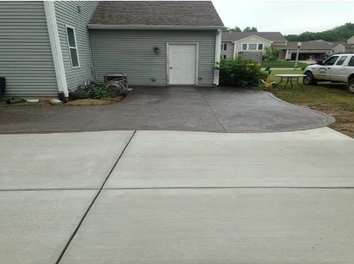 Professional lawn care service for beautiful yards in Grand Ledge, MI by Cornerstone Concrete & Contrng