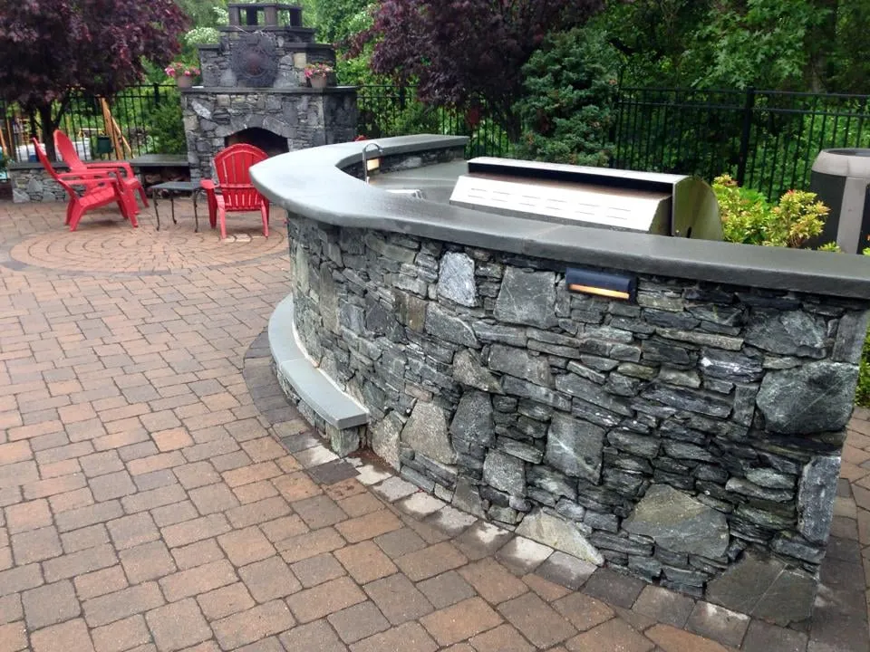 Professional residential landscaping for year-round maintenance in West Warwick, RI by Cornerstone Masonry and Landscaping
