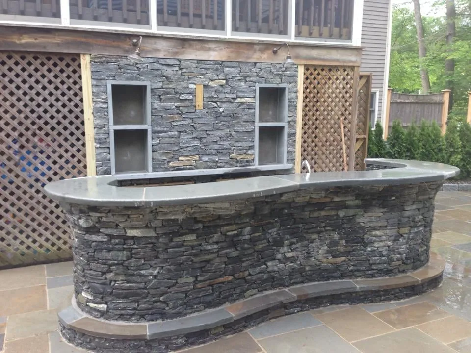 Professional yard cleanup service in West Warwick, RI by Cornerstone Masonry and Landscaping