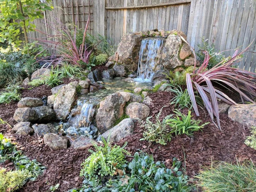 Professional outdoor landscaping in Orangevale, CA by Cornerstone Ponds and Waterfalls