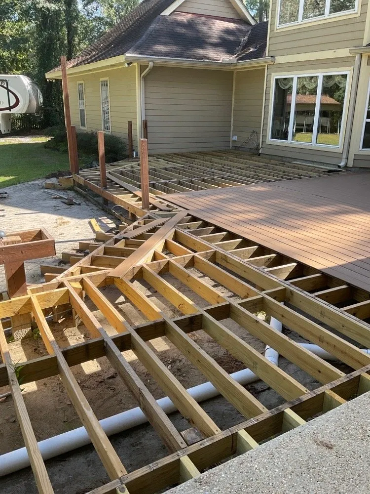 Custom landscape installation with custom design in Slidell, LA by Cornerstone Property Services, LLC