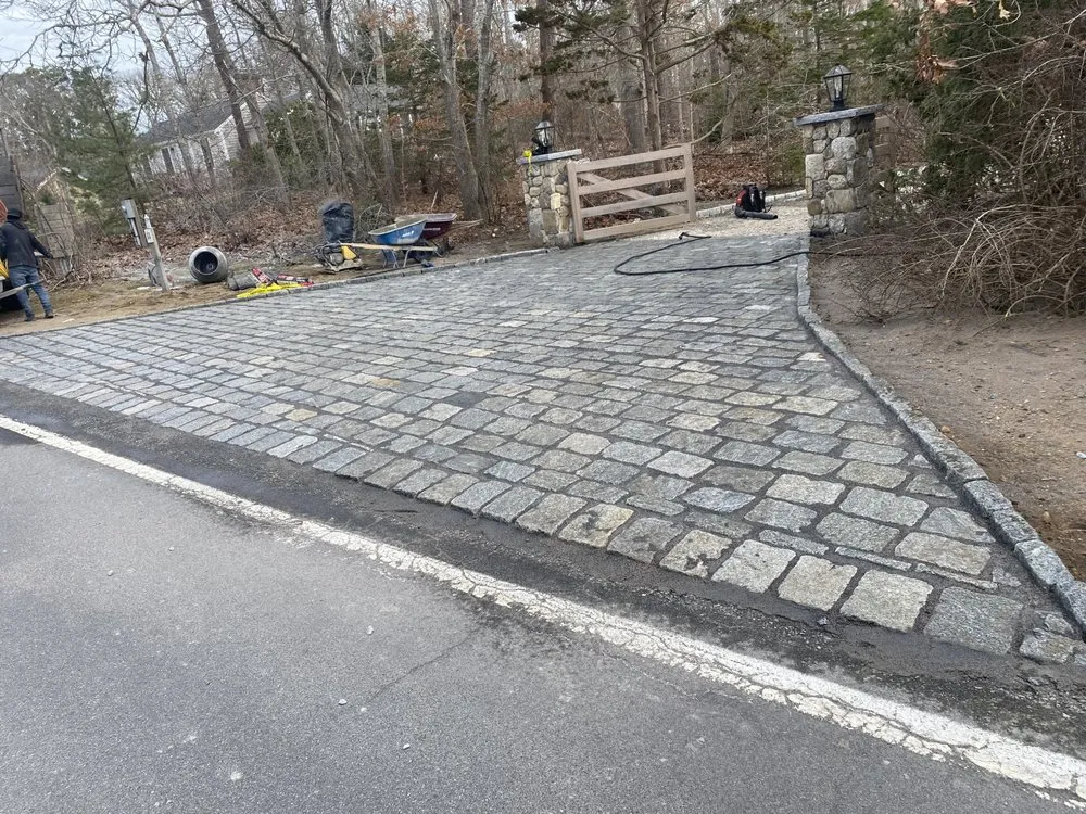 Reliable lawn mowing service for year-round maintenance in Framingham, MA by Corona and Sons Landscaping