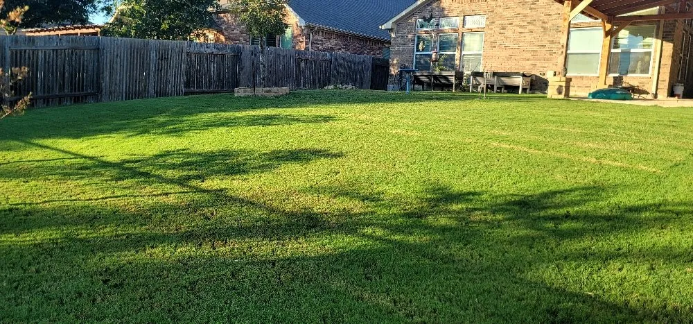 Professional lawn care service for residential properties across Del Valle, TX - Corona Lawn Services