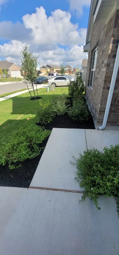 Local landscaping services with custom design in Del Valle, TX by Corona Lawn Services