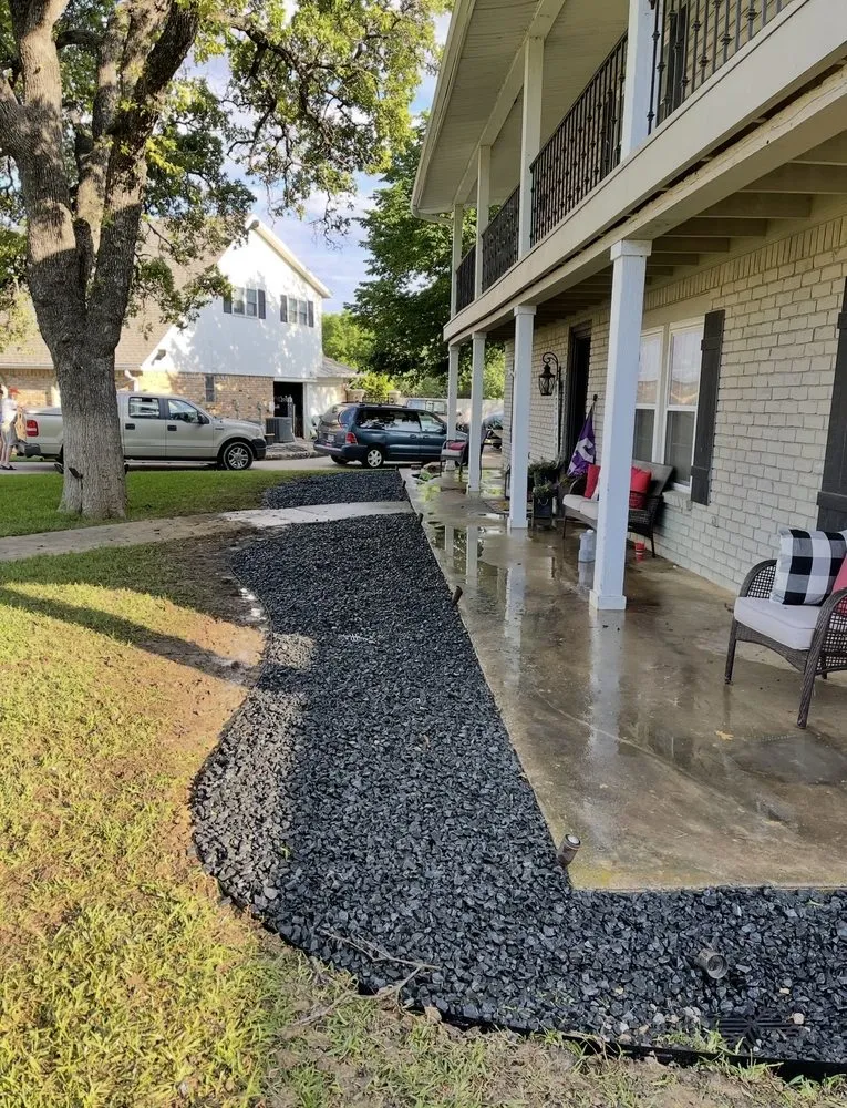 Affordable yard cleanup service for residential properties in Grand Prairie, TX by Coronado Contractors & Landscaping