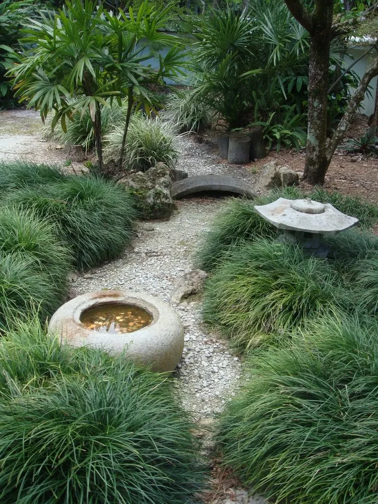 Custom landscape installation for year-round maintenance in Miami, FL by Cortada Landscape Design