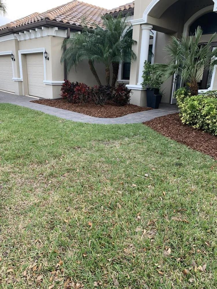 Affordable lawn care service for residential properties in Rockledge, FL by Cortes & Sons Services