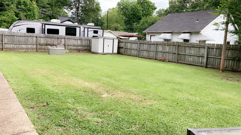 Custom yard cleanup service for year-round maintenance in Greenwood, MS by Cortes Lawn Care