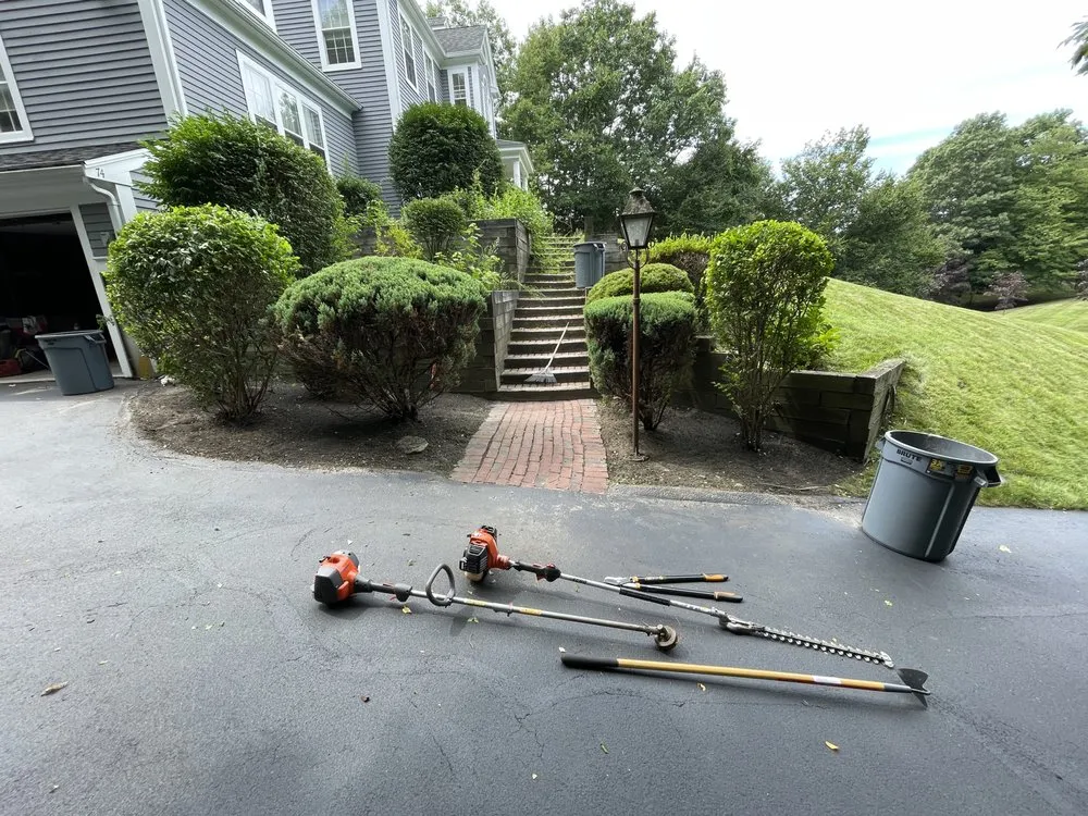 Expert lawn mowing service for residential properties in Braintree, MA by Coste Landscaping