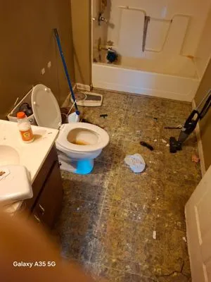 Costello property management and lawn care services Logo