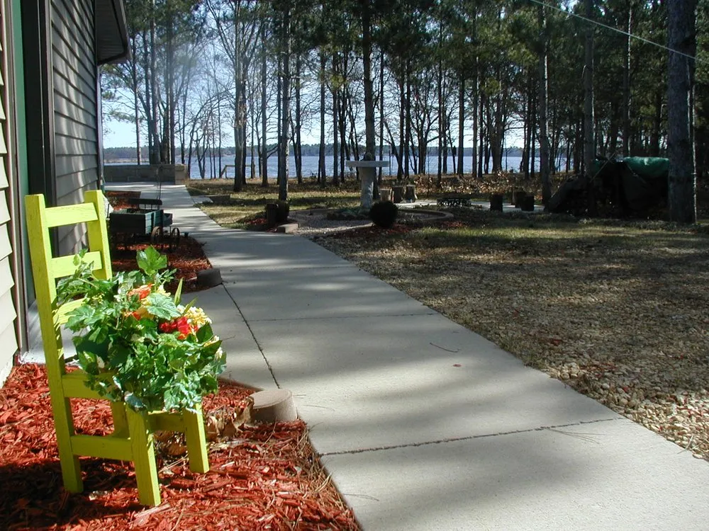 Affordable yard cleanup service for residential properties in Nekoosa, WI by Cottage Keeper
