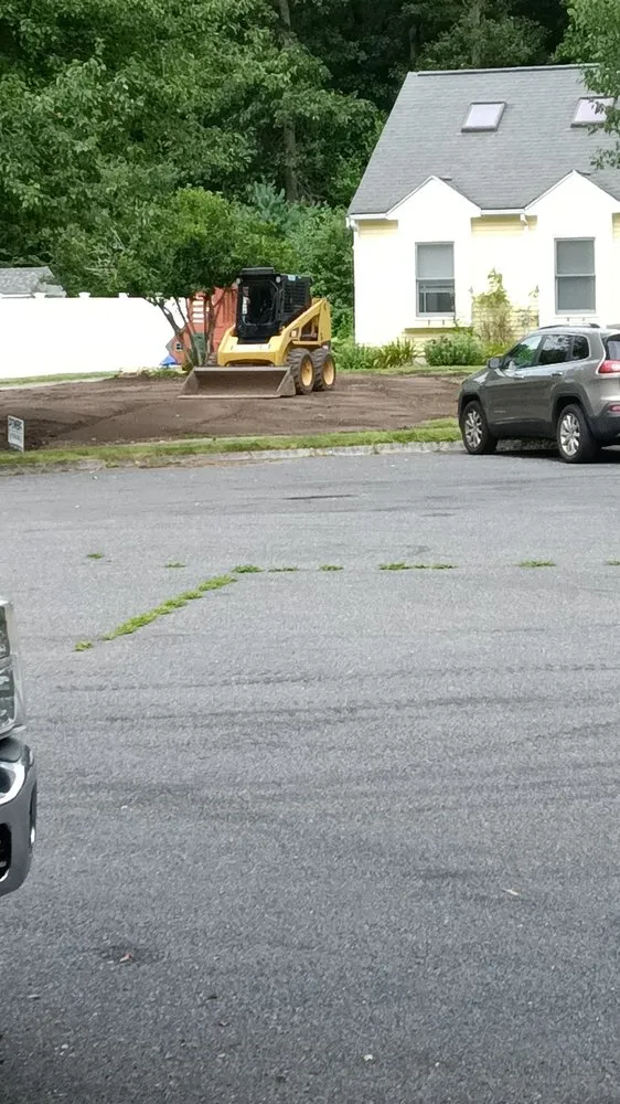 Affordable lawn care service for year-round maintenance in Easton, MA by Cottam's Landscaping