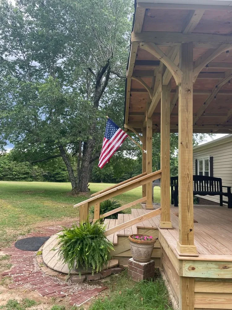 Professional yard cleanup service for homes in Perryville, AR by Cotter Cabinets