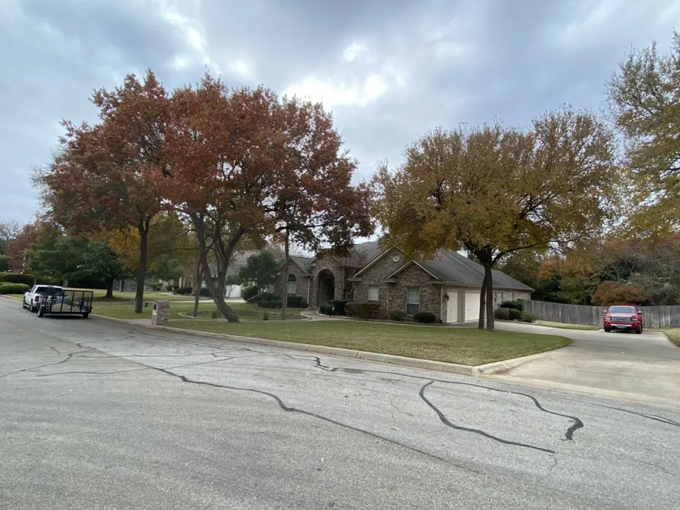 Affordable yard cleanup service in Belton, TX by Coufal Landscapes