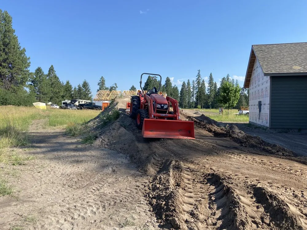 Top-rated landscaping services for year-round maintenance across Kalispell, MT - Country Boy Tractor
