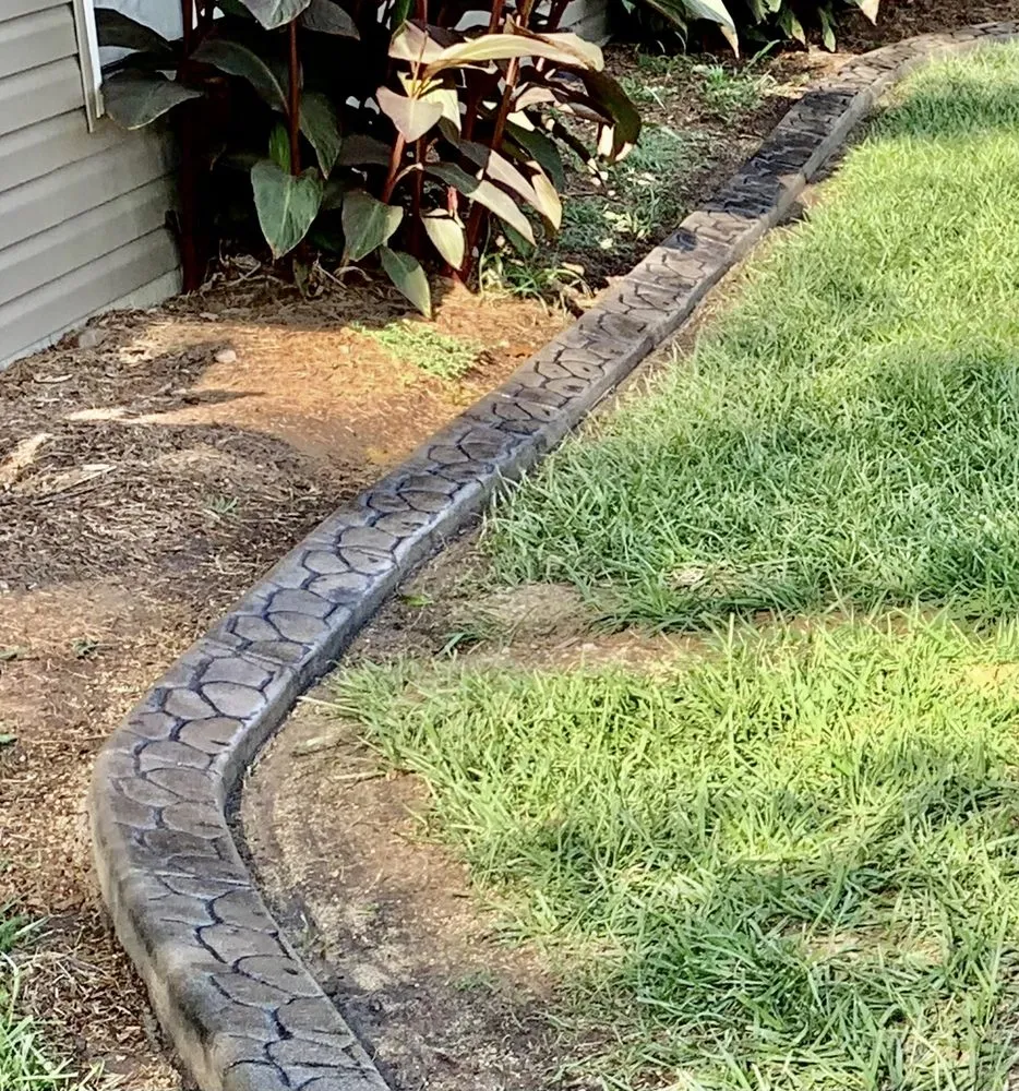 Local lawn mowing service in Rockville, IN by Country Curbs