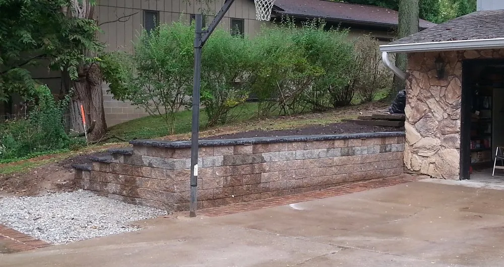 Custom yard cleanup service for residential properties across East Moline, IL - Countryman Hardscape & Landscape