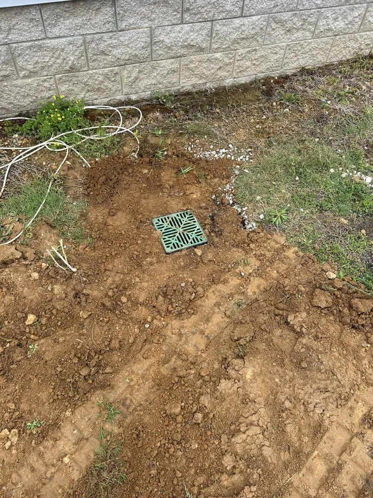 Custom landscape installation in Utica, KY by County Line Earthworks