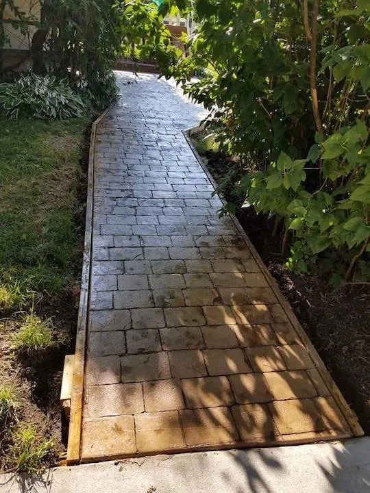 Affordable landscape installation with custom design in Kewanee, IL by County Line Service