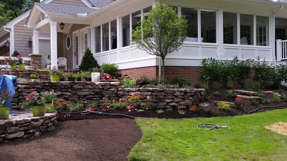 Custom landscape installation near you across Chagrin Falls, OH - Cowboy Earthworks