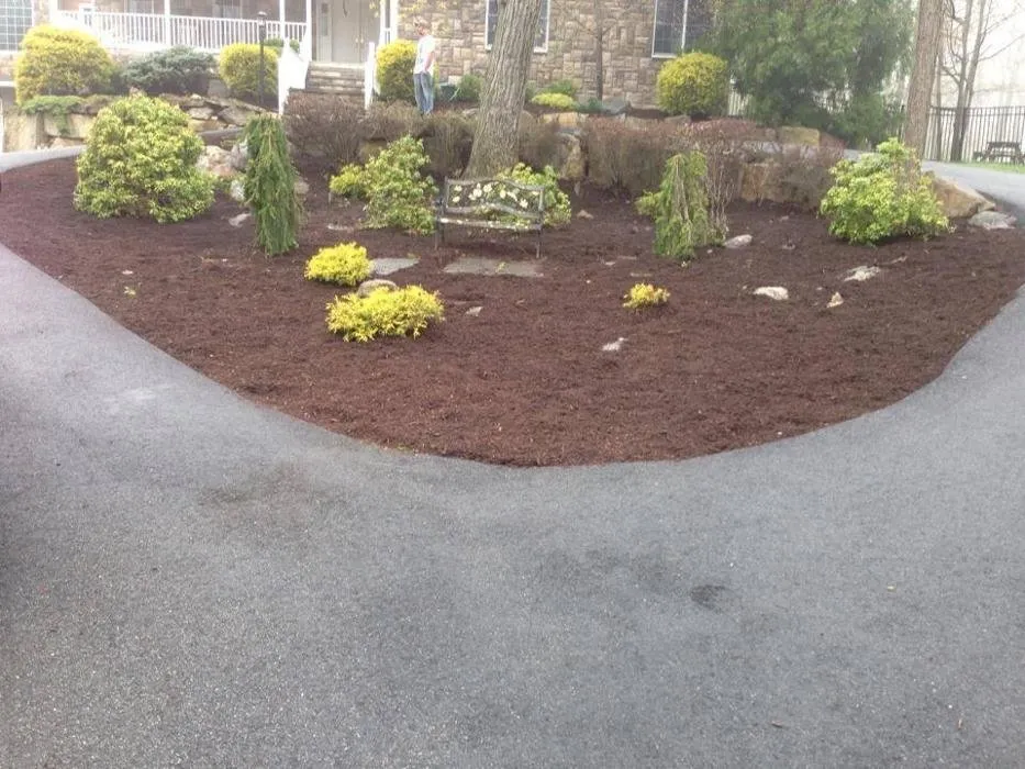 Custom lawn care service for year-round maintenance across West Milford, NJ - Cox's Landscaping & Design
