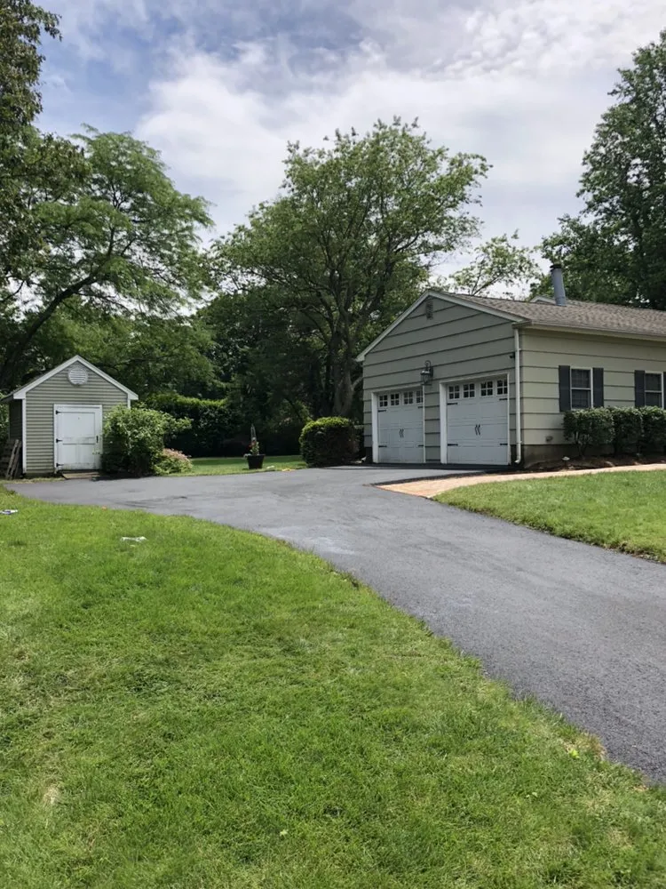 Professional lawn care service for year-round maintenance across Manasquan, NJ - CRA Site Development