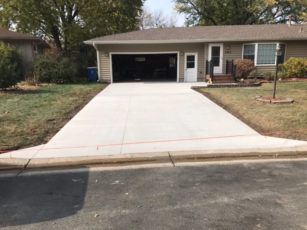 Top-rated lawn mowing service with custom design in Hudson, WI by Craft Concrete and Landscaping