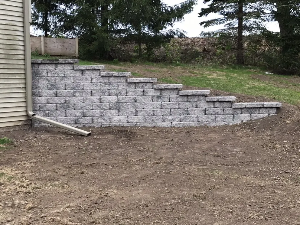 Local yard cleanup service for year-round maintenance across Hudson, WI - Craft Concrete and Landscaping