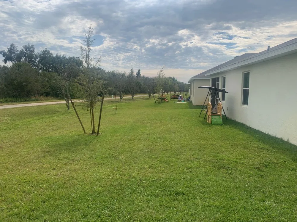 Affordable outdoor landscaping with custom design in Port Charlotte, FL by Crafts Lawn Care