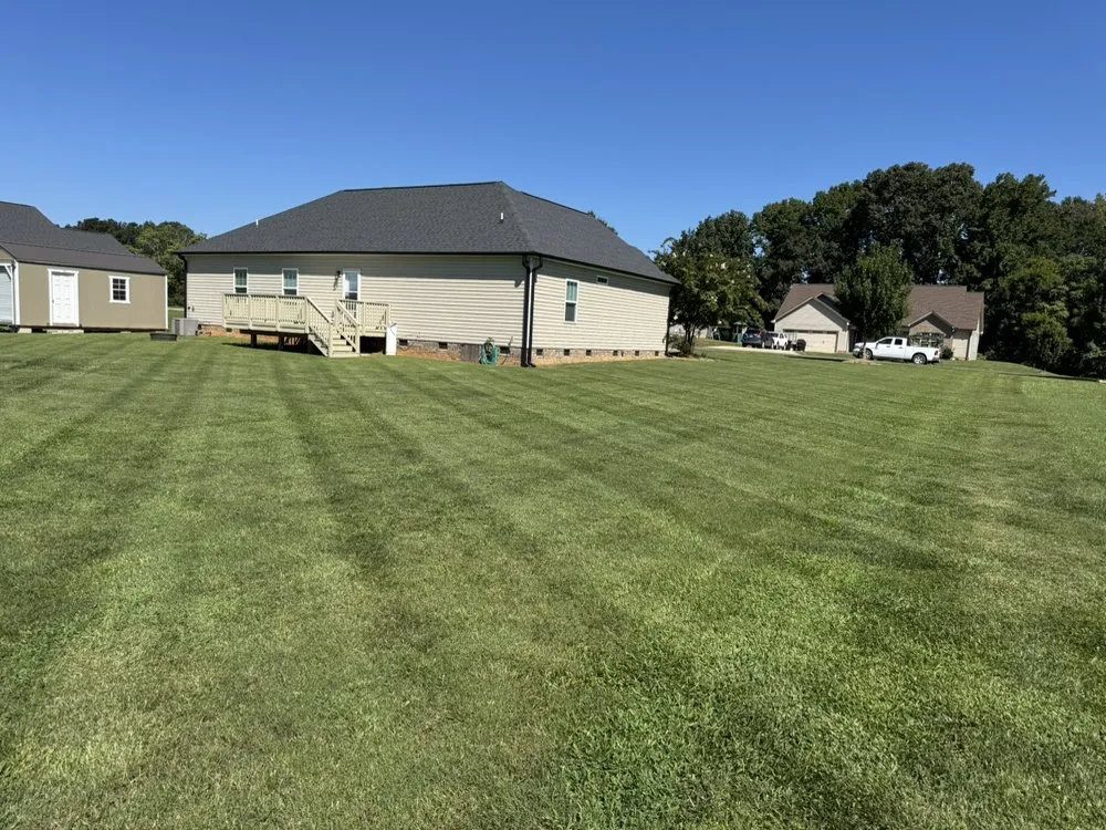 Custom landscape installation for homes in Locust, NC by Cragan's Quality Lawn Care