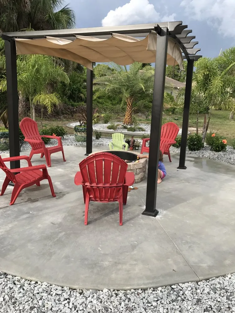 Professional landscape installation with custom design in Port Charlotte, FL by Craig's Perfect Turf Landscaping