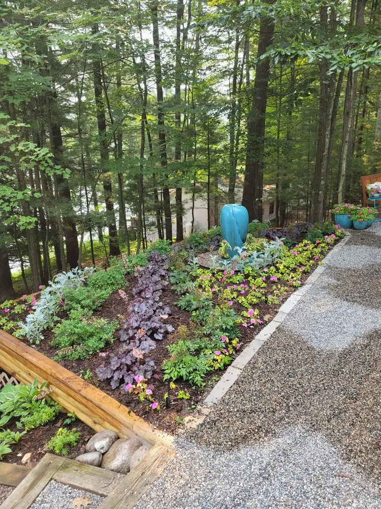 Professional outdoor landscaping with custom design in Kingsley, MI by Crain Contracting
