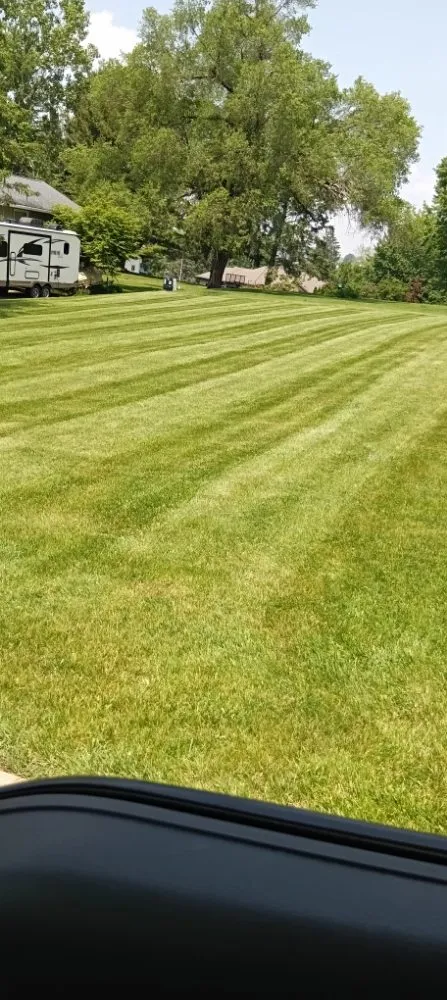 Professional lawn mowing service with custom design across Plain, WI - Crandall Lawn Care & Home Repair