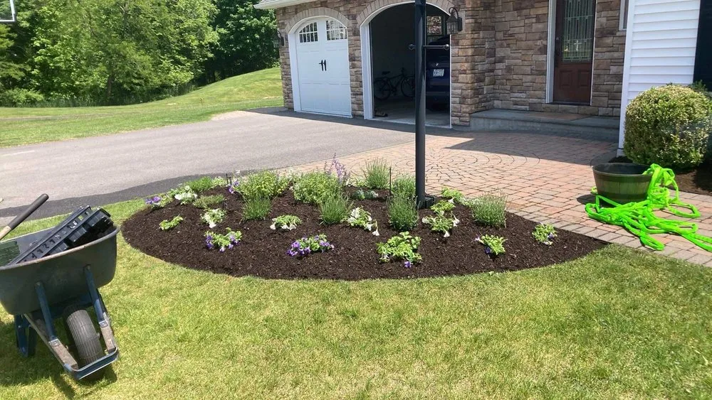 Custom outdoor landscaping with custom design across Central Bridge, NY - Crandall’s Landscaping & Design