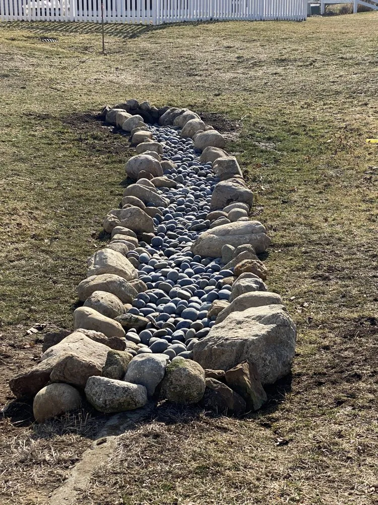 Professional yard cleanup service for homes in New Carlisle, IN by Crazy As Landscaping