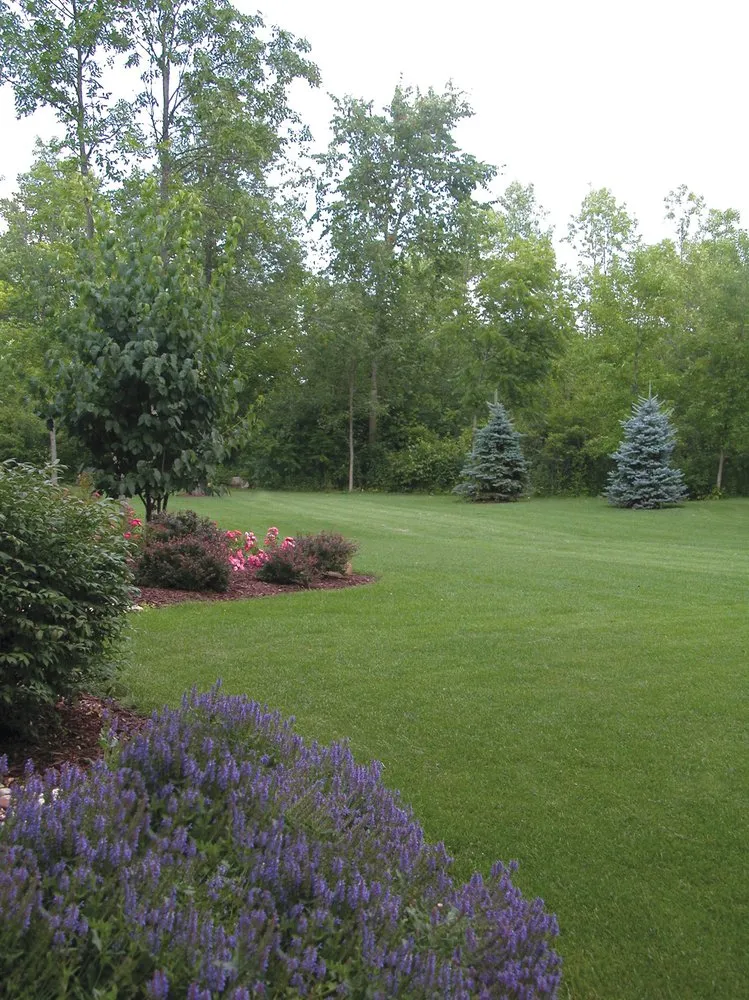 Custom lawn mowing service for outdoor upgrades in Mukwonago, WI by Createscape Landscaping Service