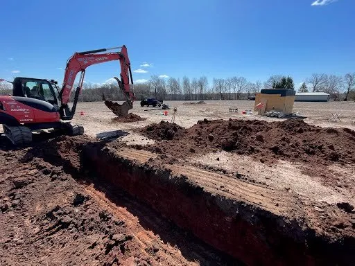 Custom landscape installation in Neenah, WI by Creation Landscaping