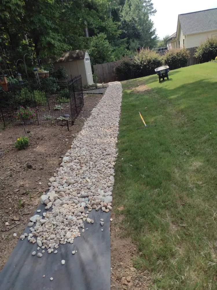 Expert lawn mowing service for residential properties in Senoia, GA by Creative Concepts