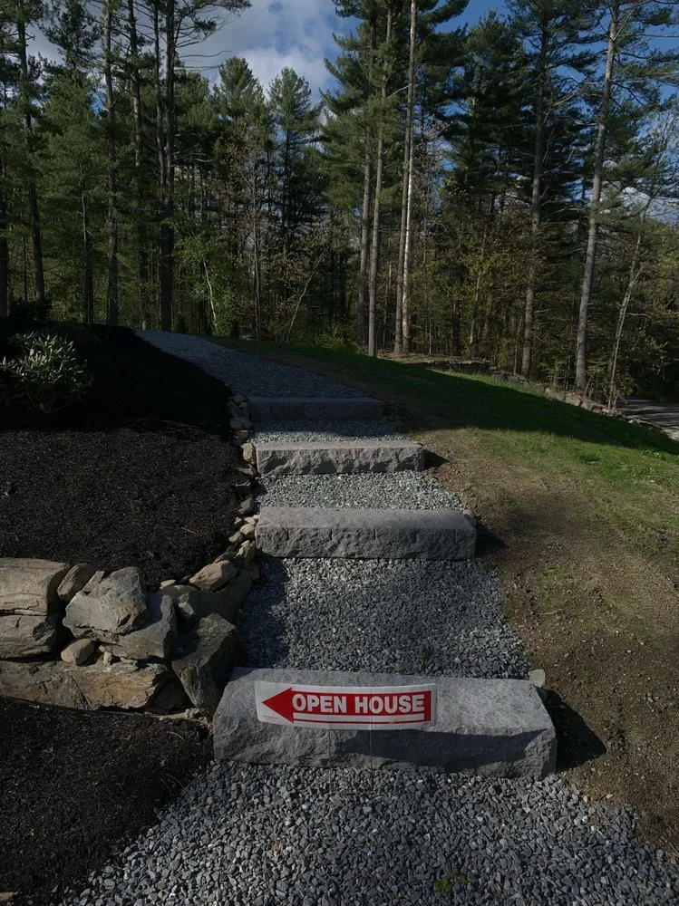 Professional yard cleanup service with custom design across Lowell, MA - Creative construction