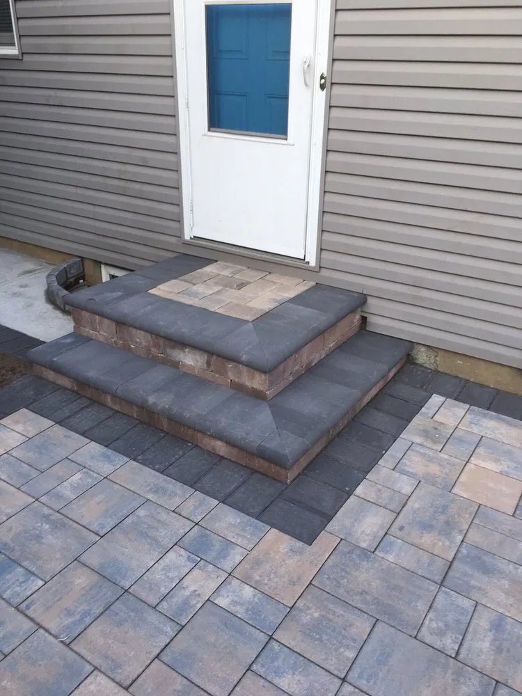 Custom landscape installation in Westbury, NY by Creative Contracting