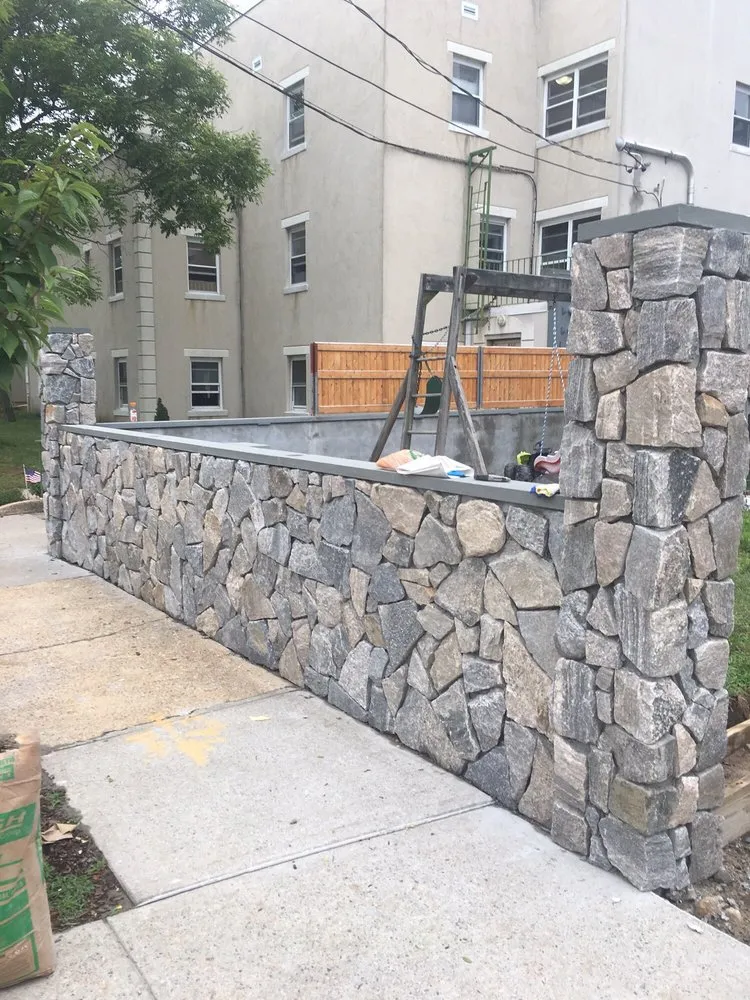 Trusted yard maintenance with custom design in Westbury, NY by Creative Contracting