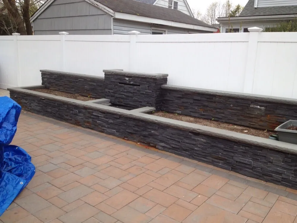 Local yard cleanup service in Westbury, NY by Creative Contracting