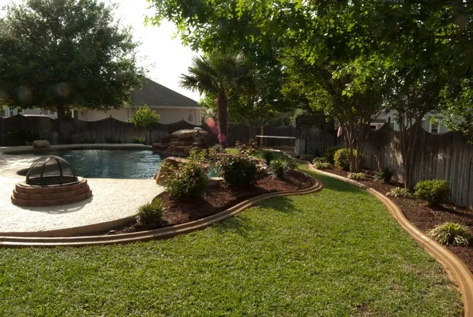 Custom garden landscaping for beautiful yards in Austin, TX by Creative Curbing