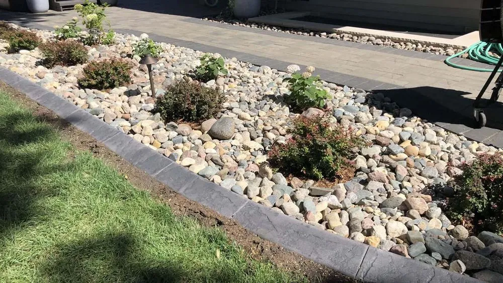 Local yard cleanup service in Glenwood, MN by Creative Curbing