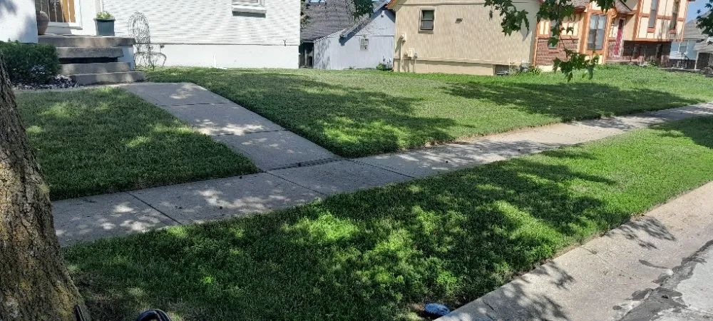 Expert outdoor landscaping for homes in Independence, MO by Creative Cut Lawn Care