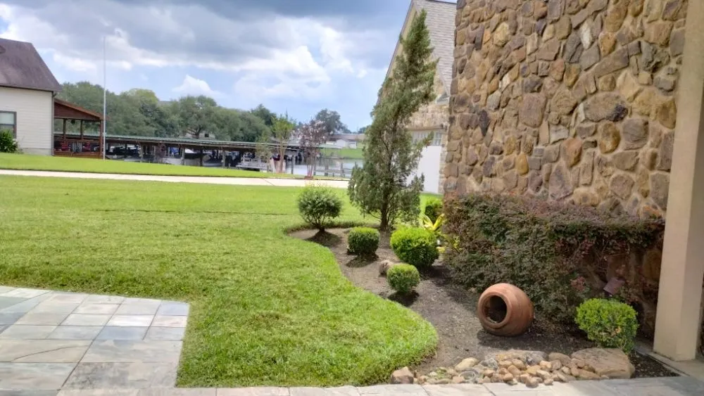 Reliable yard cleanup service for homes in Richmond, TX by Creative Environments